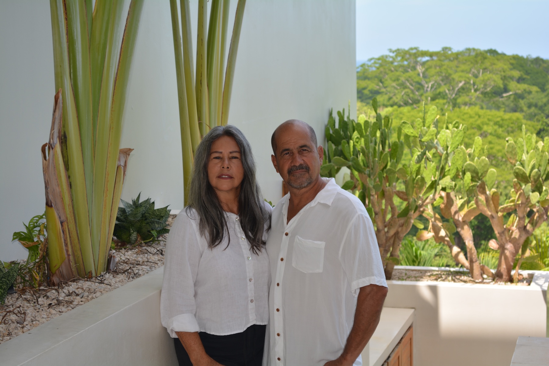 Xinia Bejarano and Harry Soto in a refined tropical garden at their home in Nosara, Costa Rica